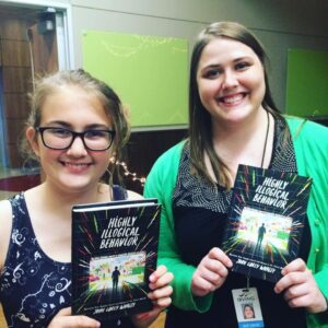 The Teen and Mary Hinson with their copies of HIGHLY ILLOGICAL BEHAVIOR