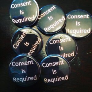 We made buttons to hand out at the march