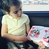 This is my 3rd grader. She is reading a book that she checked out from the library to me in the car to me. A public library provides her with access to more books and a greater variety of books than I could afford to buy her.