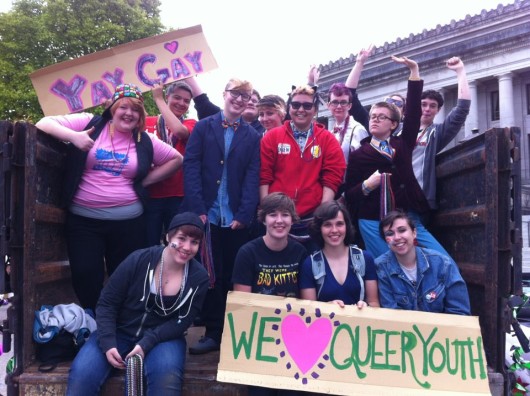 Stonewall Youth, an LGBT youth organization in Olympia WA, helped me survive high school. Here is me (burgundy blazer) at age 15 in 2012 on their Pride float.
